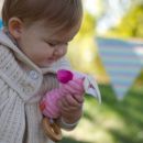 Развивающая игрушка "Розовая Собачка" infantino