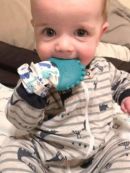 Itzy Ritzy (США) Прорезыватель рукавичка силиконовый на руку Teal Dino